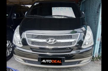 Yellow Hyundai Grand starex 2012 Van at  Automatic   for sale in Quezon City
