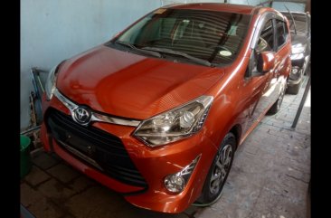 Yellow Toyota Wigo 2018 Hatchback at  Automatic   for sale in Quezon City