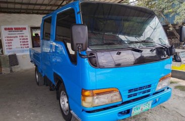 Sell White 2014 Isuzu Elf in Quezon City