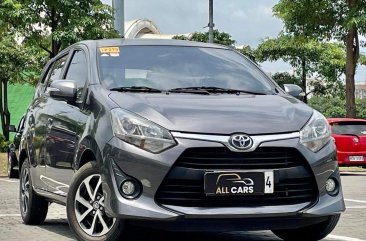 Selling White Toyota Wigo 2018 in Makati