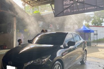 Selling White Mazda 2 2016 in Quezon City