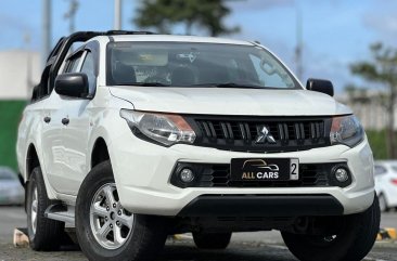 Selling White Mitsubishi Strada 2017 in Makati