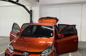 Sell Orange 2021 Toyota Wigo in Quezon City