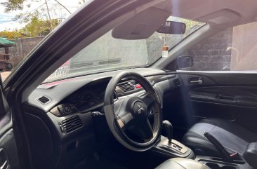 Sell White 2010 Mitsubishi Lancer in Rosales