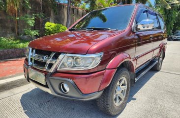 Maroon Isuzu Sportivo x 2013 for sale in Quezon City