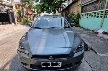 Selling White Mitsubishi Lancer 2014 in Caloocan