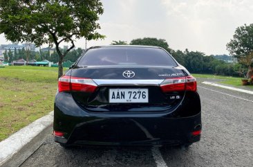 Selling White Toyota Corolla altis 2014 in Quezon City