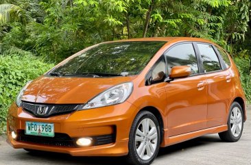 Orange Honda Jazz 2013 for sale in Las Piñas