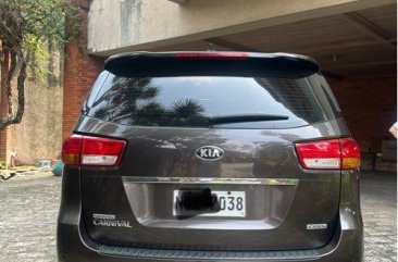 Selling Bronze Kia Carnival 2016 in Quezon City