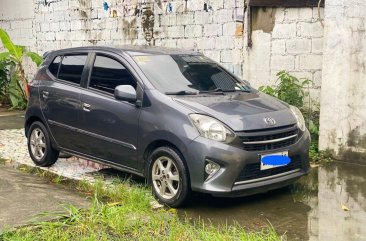 Sell White 2014 Toyota Wigo in Quezon City