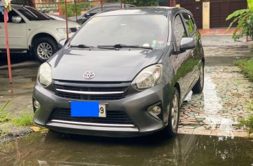 Sell White 2014 Toyota Wigo in Quezon City