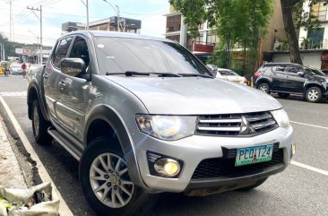 Selling White Mitsubishi Strada 2010 in Quezon City