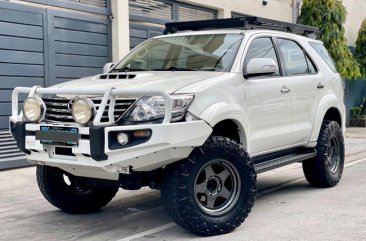 Pearl White Toyota Fortuner 2013 for sale in Manila