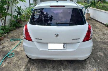 Selling White Suzuki Swift 2014 in Makati