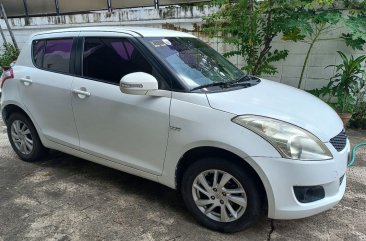 Selling White Suzuki Swift 2014 in Makati