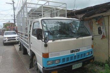 Selling White Isuzu Elf 2023 in Cebu City