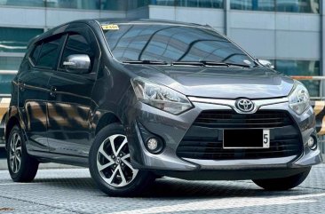 Selling White Toyota Wigo 2019 in Makati