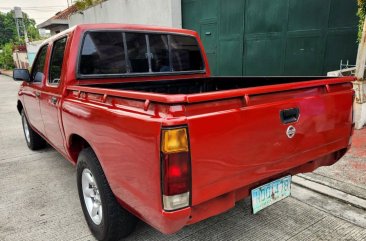 Sell Bronze 2009 Nissan Frontier in Quezon City