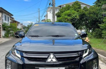 Selling White Mitsubishi Strada 2021 in Caloocan