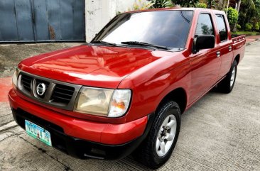 Sell Bronze 2009 Nissan Frontier in Quezon City