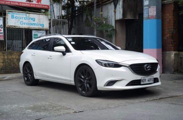 Sell White 2016 Mazda 2 in Makati