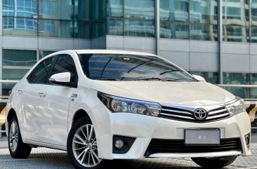 Selling White Toyota Altis 2015 in Makati