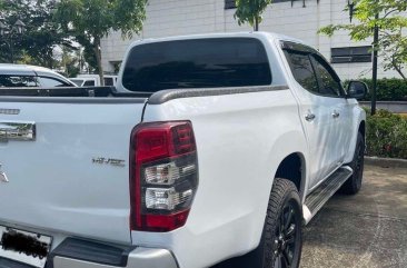 Selling White Mitsubishi Strada 2020 in Quezon City