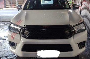 White Toyota Hilux 2019 for sale in Quezon City