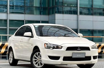 Selling White Mitsubishi Lancer ex 2014 in Makati