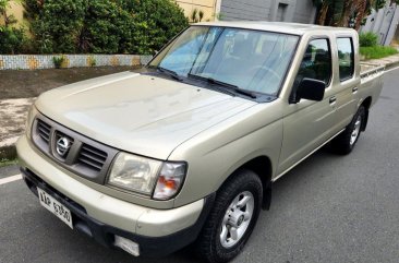 Sell Bronze 2014 Nissan Frontier in Quezon City