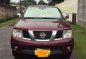 Nissan Navara 2011 4x2 AT Red For Sale -0
