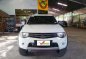 2013 Mitsubishi Strada GLS Sport V MT White For Sale -0