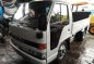 For sale Isuzu Elf Dropside with Lifter-1