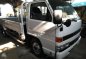For sale Isuzu Elf Dropside with Lifter-3
