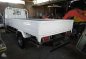 For sale Isuzu Elf Dropside with Lifter-5