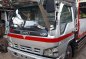 Isuzu Elf 4HE1 TURBO Silver Truck For Sale -1