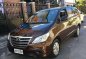 2014 Toyota Innova E AT Brown SUV For Sale -0