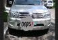 Toyota Fortuner G 2011 AT Silver SUV For Sale -0