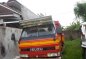 Isuzu Elf 4BC1 14ft Dropside Red Truck For Sale -1