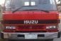 Isuzu Forward Dropside 21ft 6HE1 Red For Sale -0