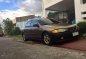 Mazda 323 Rayban Gen 2.5 MT Brown For Sale -0