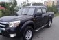 Ford Ranger 2010 XLT MT Black Pickup For Sale -2