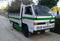 Isuzu Elf 10ft Single Tire Manual White For Sale -0