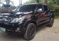 2010 Toyota Hilux G 4x4 MT Black Pickup For Sale -0