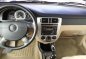 Manual tranny 2004 Chevrolet Optra all power elegant interior for sale-3