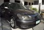 Toyota Camry 2004 2.4 E AT Brown Sedan For Sale -0
