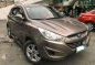 2012 Hyundai Tucson Theta II AT Brown For Sale -0