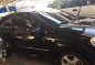 Chevrolet Aveo 2012 Lt. VGIS AT Black Sedan For Sale -1