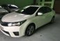 Toyota Corolla Altis 2014 MT 1.6 White For Sale -4