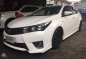 2014 Toyota Corolla Altis E MT White For Sale -0